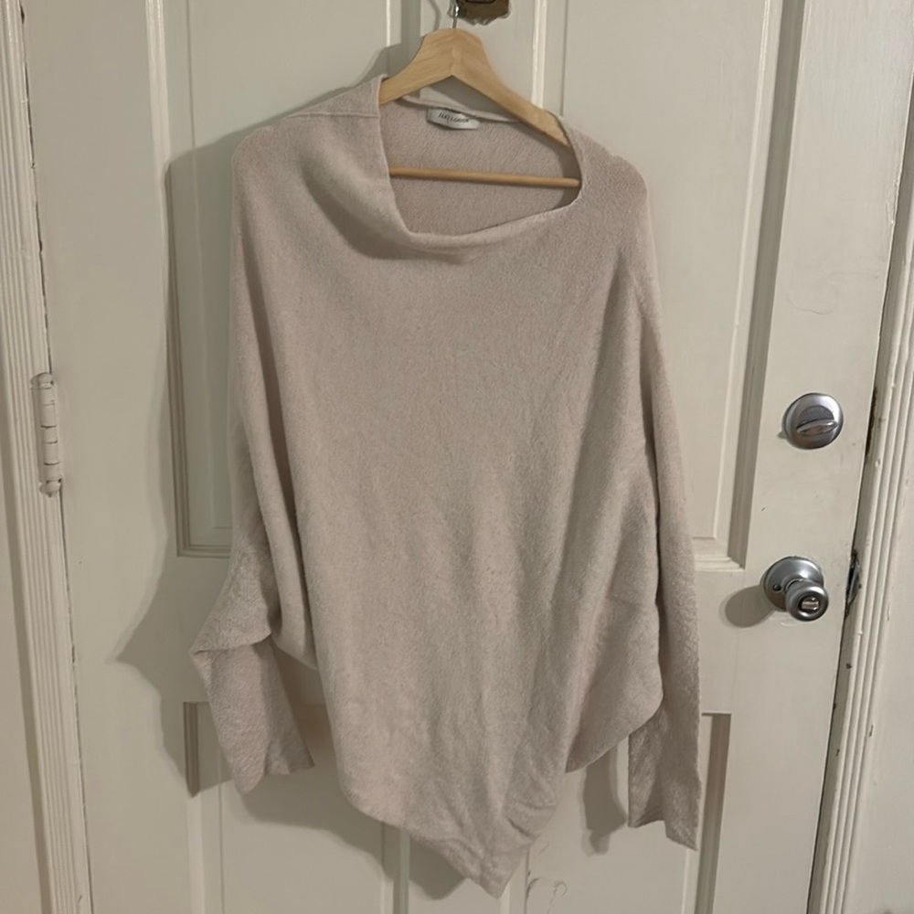 Cream off the shoulder versatile sweater.